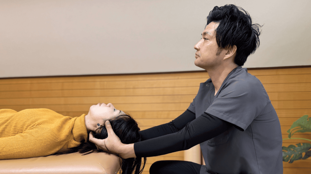 首の施術